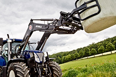 New Holland mit Frontlader Bild